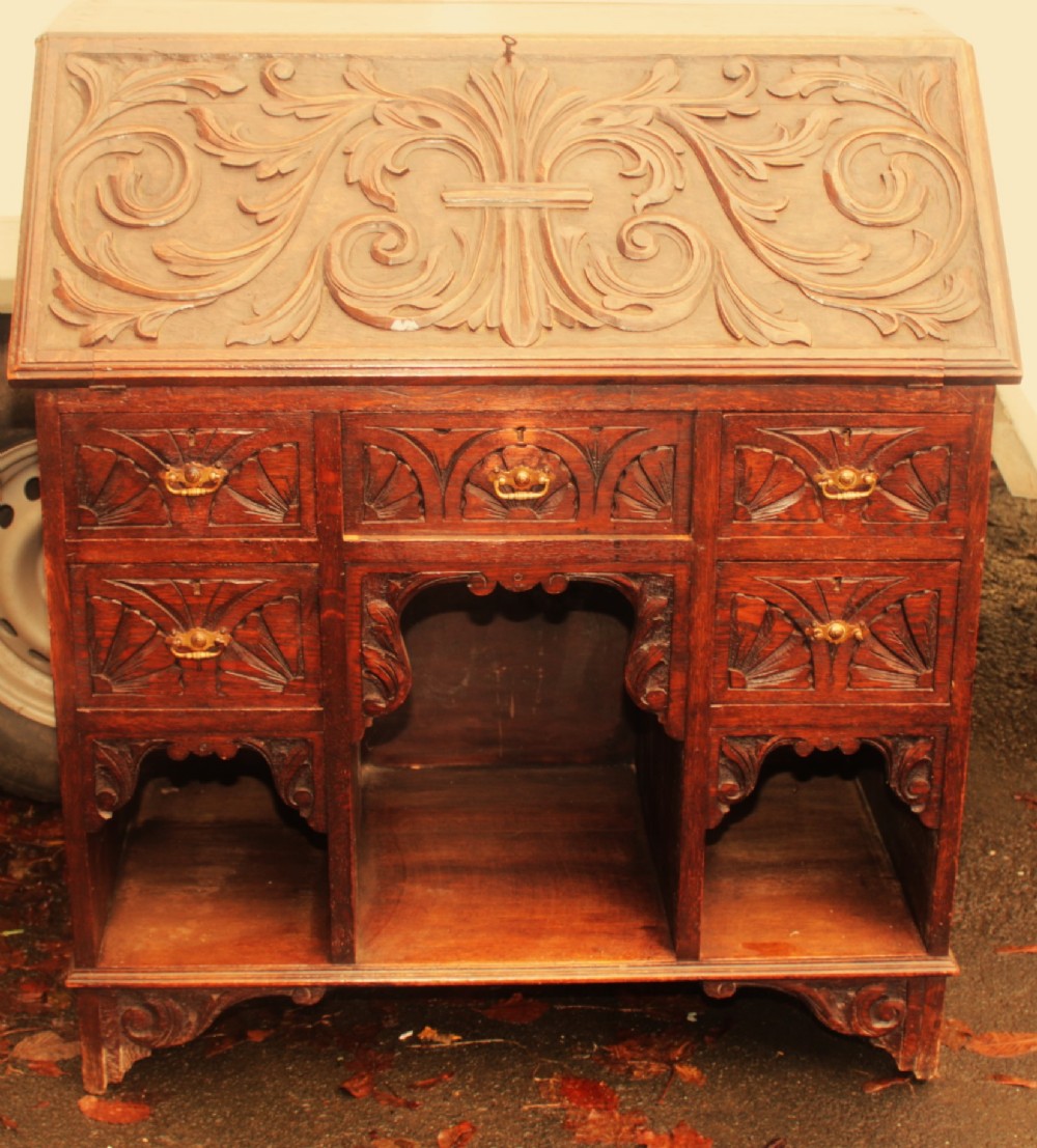 Carved oak bureau,Victorian.
