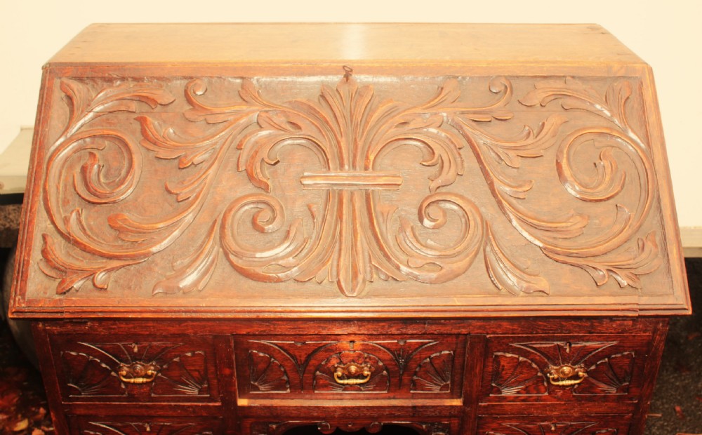 Carved oak bureau,Victorian. View V