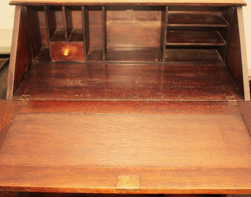 Carved oak bureau,Victorian. View VI