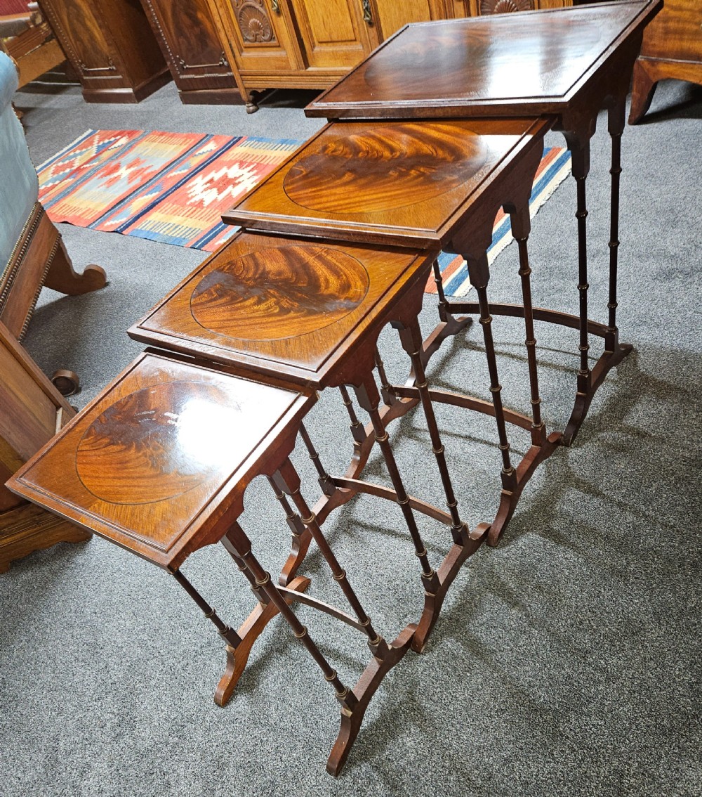 A nest of 4 tables. 