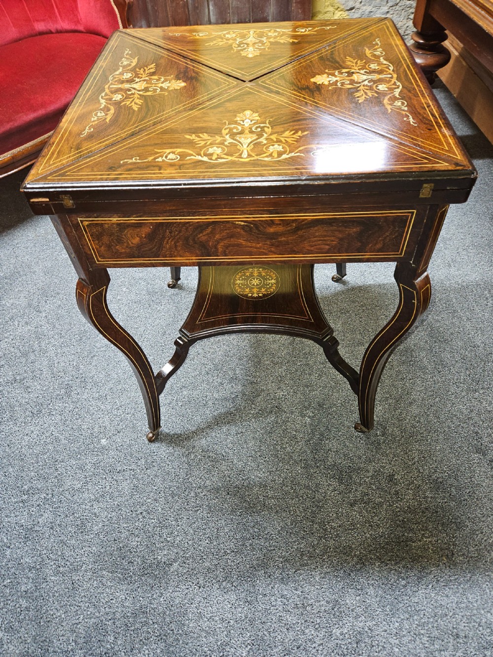 Rosewood envelope games table.