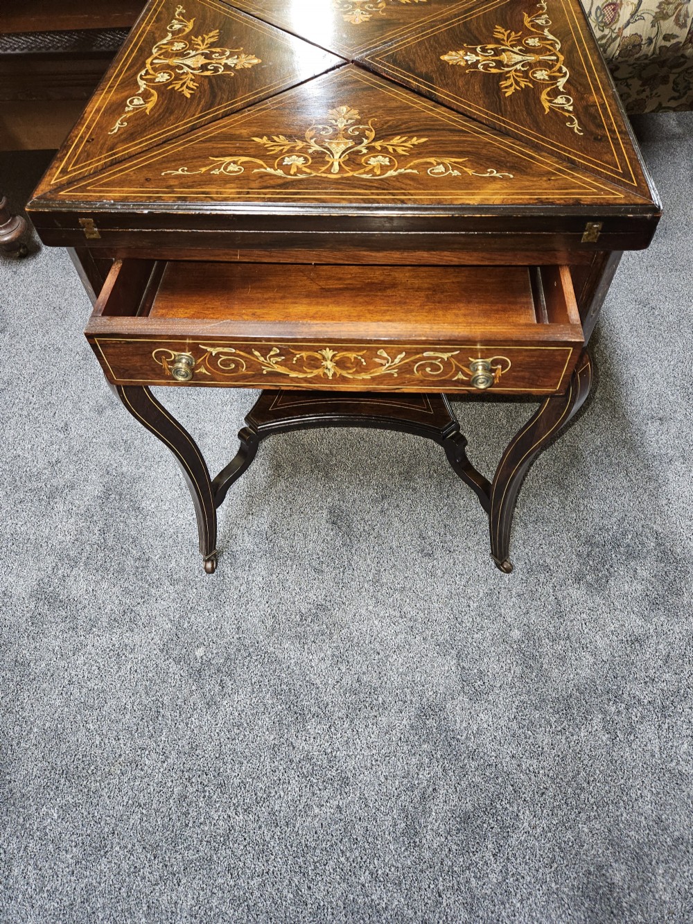 Rosewood envelope games table. View IV