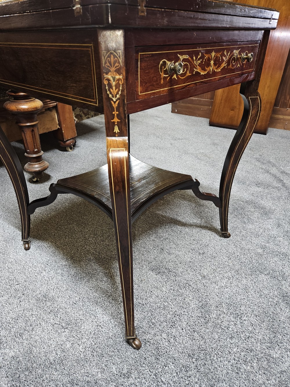 Rosewood envelope games table. View VIII