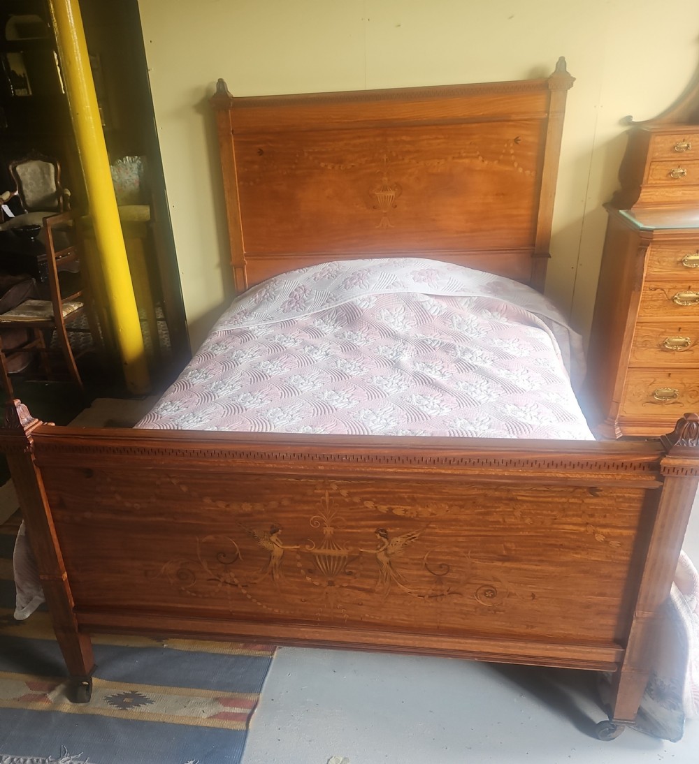 Satinwood bed by Gillows. 