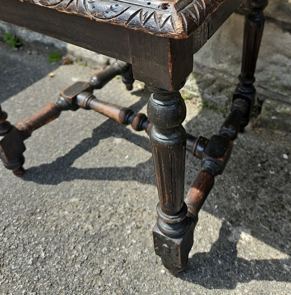 A pair of Victorian carved oak chairs View IV