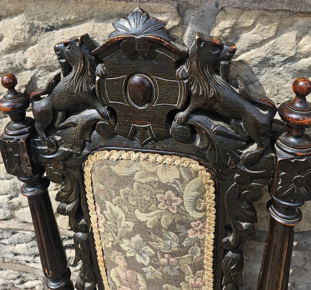 A pair of Victorian carved oak chairs View V