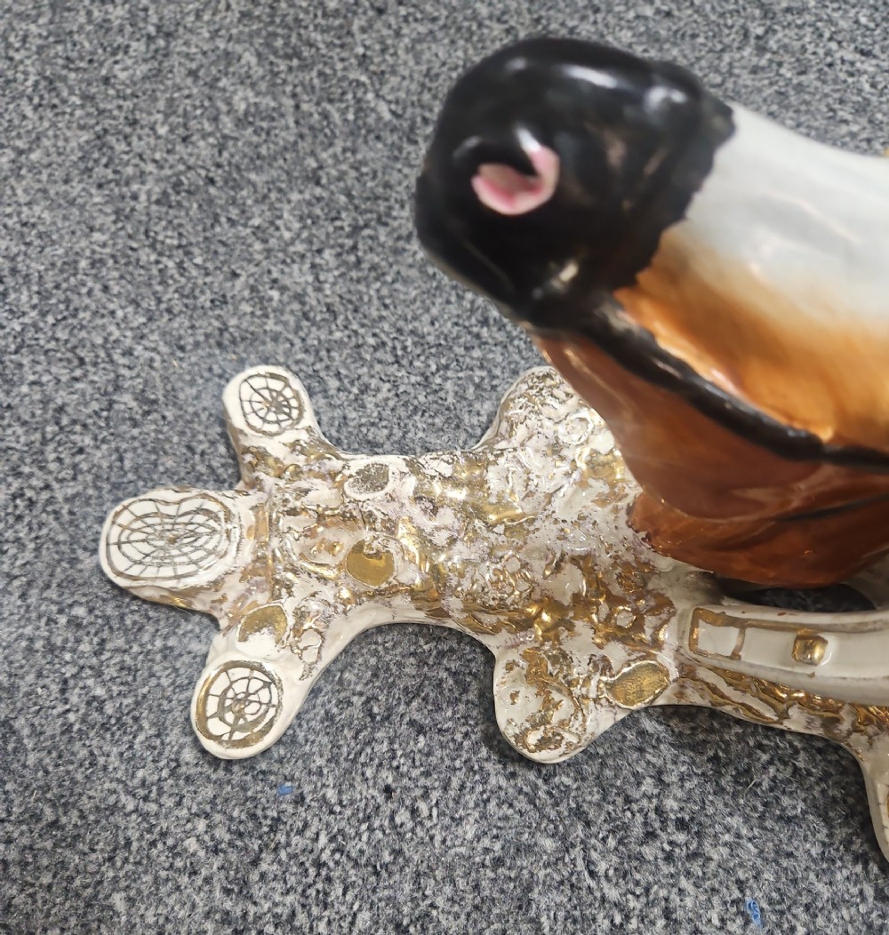 A pair of Victorian Staffordshire earthenware wall brackets featuring moulded horse heads framed by horseshoes with gilded decorative borders. View XI