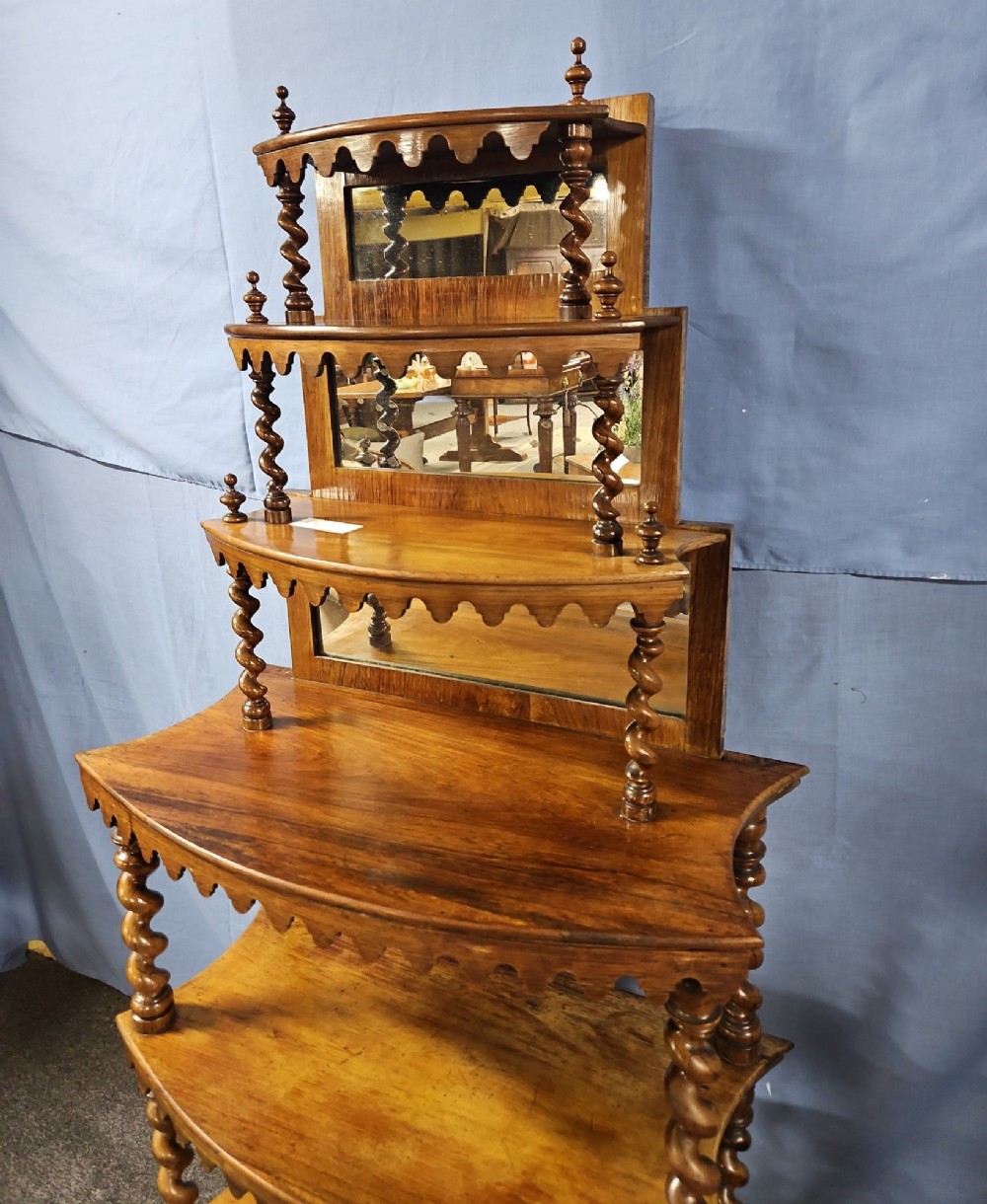 Victorian rosewood display shelves.
