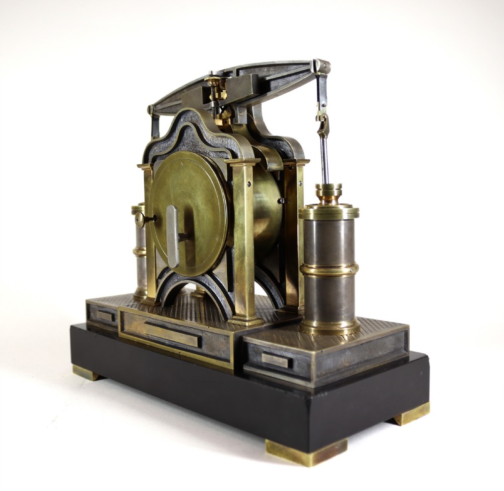 An industrial French automaton clock designed in the shape of a steam beam engine with brass and dark bronze components set on a black slate plinth. View VIII