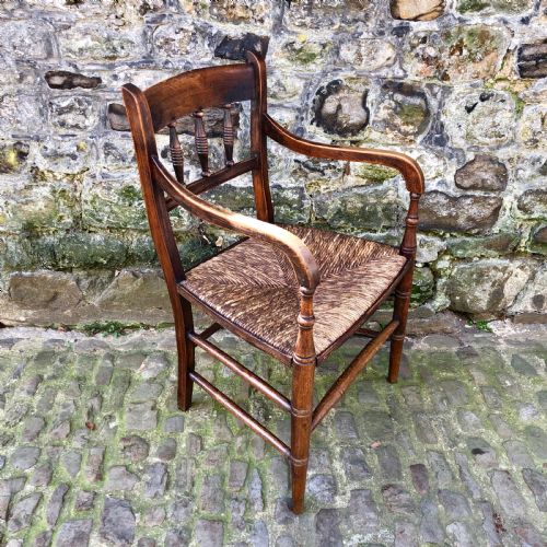 AN EARLY 19TH CENTURY COUNTRY ELBOW CHAIR - ADDITIONAL PHOTO 1