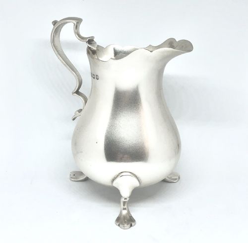 a silver baluster shaped milk jug - CATEGORY: ANTIQUE SILVER - DATED 1940