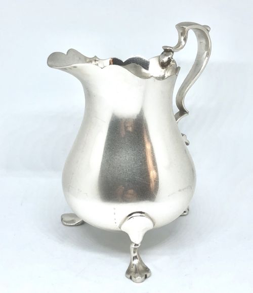 A SILVER BALUSTER SHAPED MILK JUG - ADDITIONAL PHOTO 1