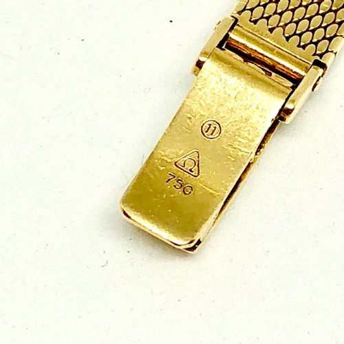 AN 18 CARAT GOLD OMEGA LADIES WRISTWATCH CIRCA 1957 - ADDITIONAL PHOTO 5