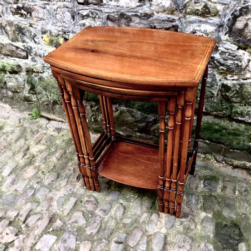 AN EDWARDIAN NEST OF FOUR MAHOGANY SIDE TABLES - ADDITIONAL PHOTO 2
