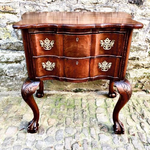 A PORTUGUESE MAHOGANY CHEST OF TWO DRAWERS