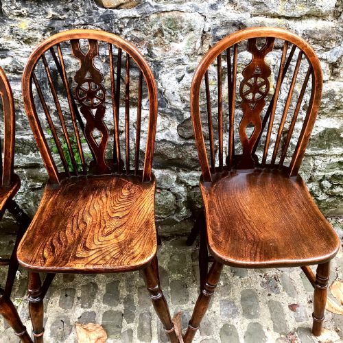 A SET OF SIX LATE 19TH CENTURY WINDSOR WHEELBACK CHAIRS - ADDITIONAL PHOTO 4