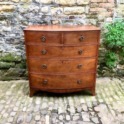 a regency bowfront chest of drawers - CATEGORY: ANTIQUE CHEST OF DRAWERS - DATED REGENCY