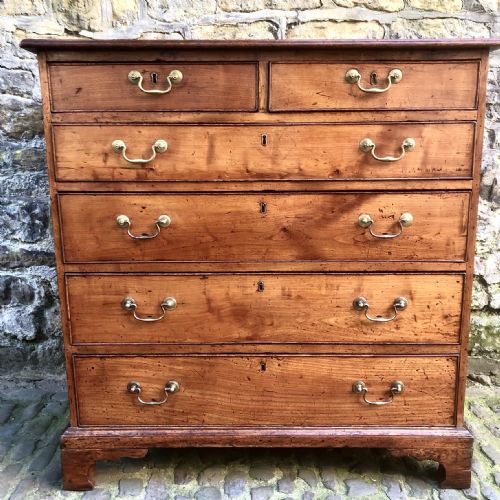 A GEORGE III CHERRY WOOD CHEST OF DRAWERS - ADDITIONAL PHOTO 2