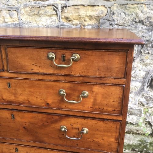 A GEORGE III CHERRY WOOD CHEST OF DRAWERS - ADDITIONAL PHOTO 5