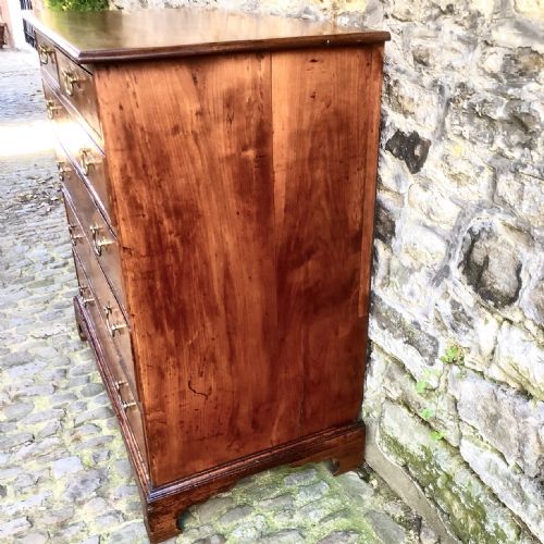 A GEORGE III CHERRY WOOD CHEST OF DRAWERS - ADDITIONAL PHOTO 6