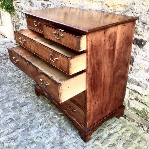 A GEORGE III CHERRY WOOD CHEST OF DRAWERS - ADDITIONAL PHOTO 7