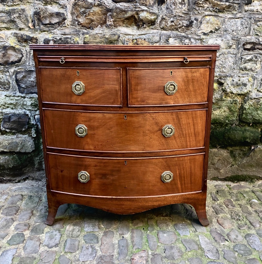 A small mid Victorian mahogany  bowfronted chest of drawers  View II