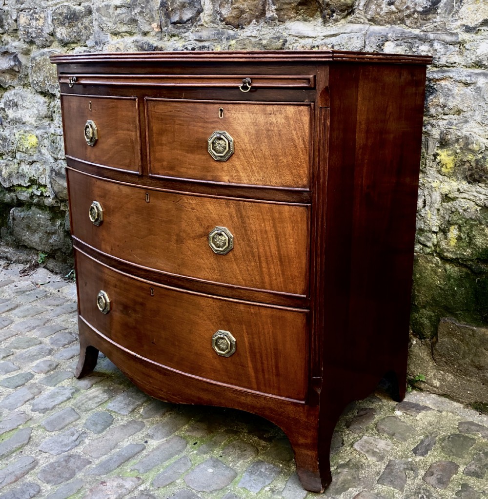 A small mid Victorian mahogany  bowfronted chest of drawers  View III