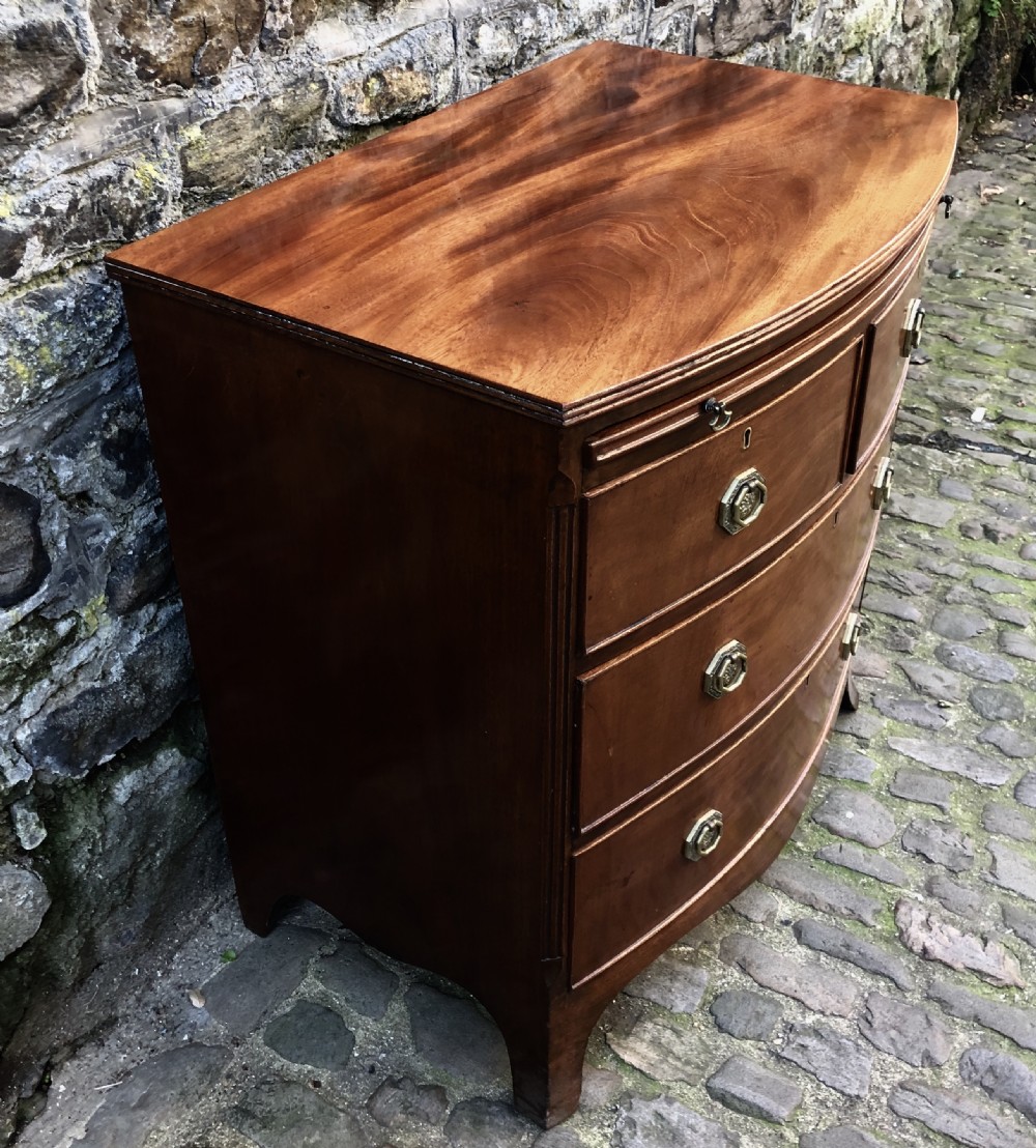 A small mid Victorian mahogany  bowfronted chest of drawers  View IV