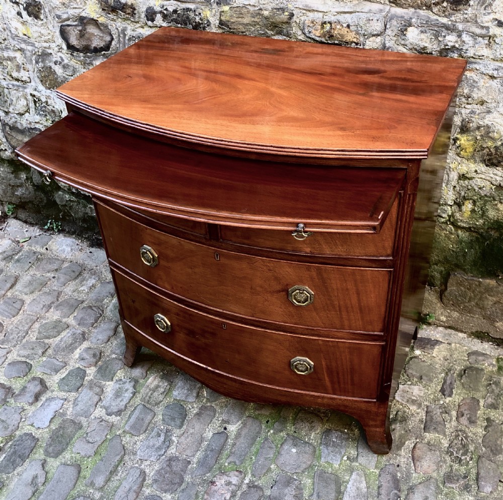 A small mid Victorian mahogany  bowfronted chest of drawers  View V