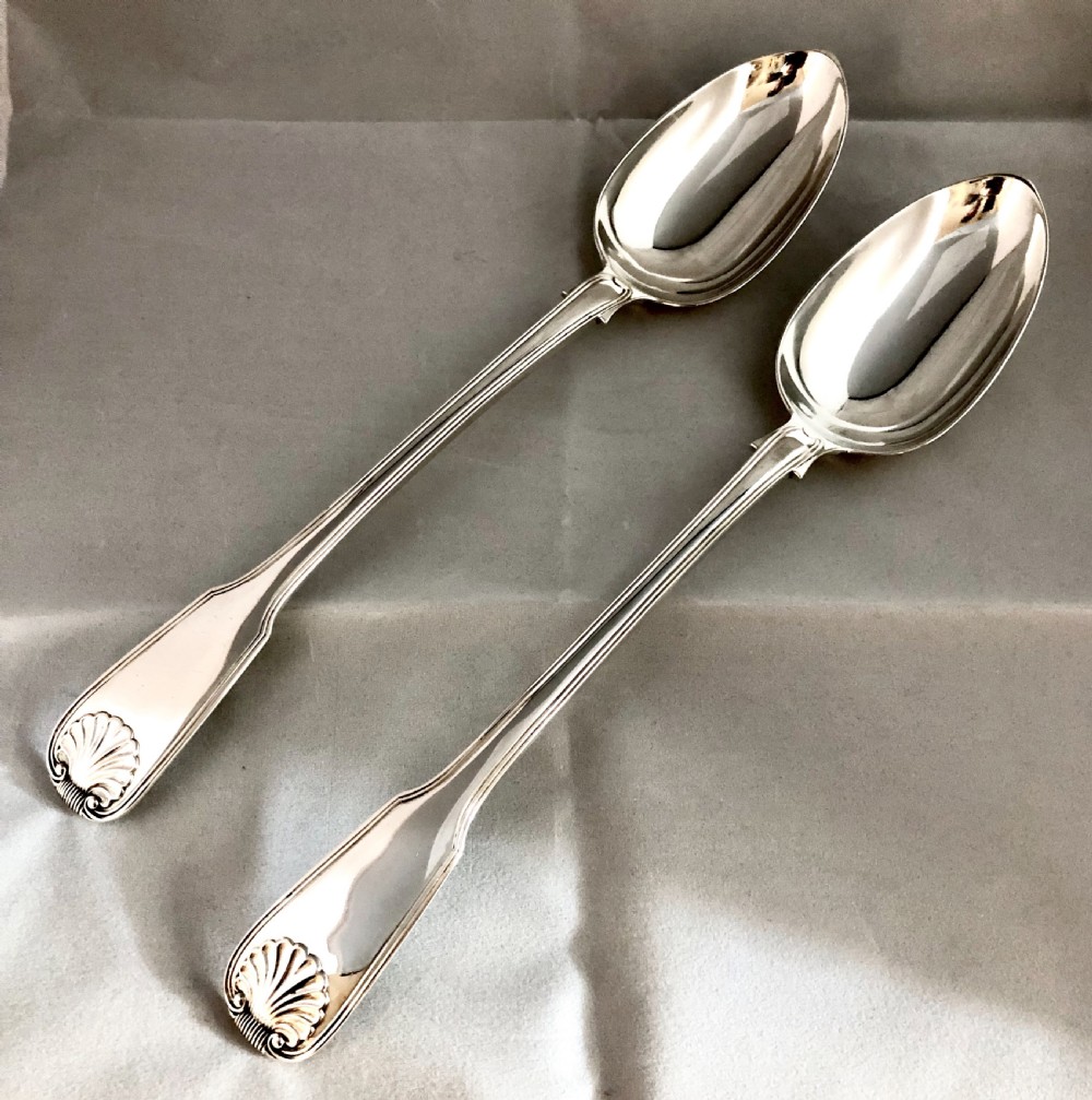Pair of William IV silver basting or serving spoons London 1830