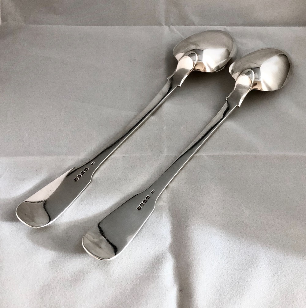 Pair of William IV silver basting or serving spoons London 1830 View II