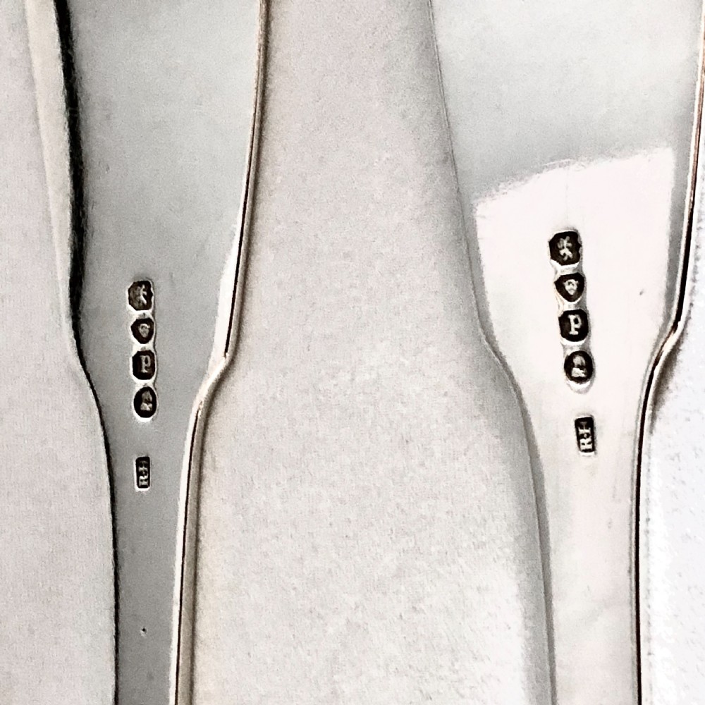 Pair of William IV silver basting or serving spoons London 1830 View IV