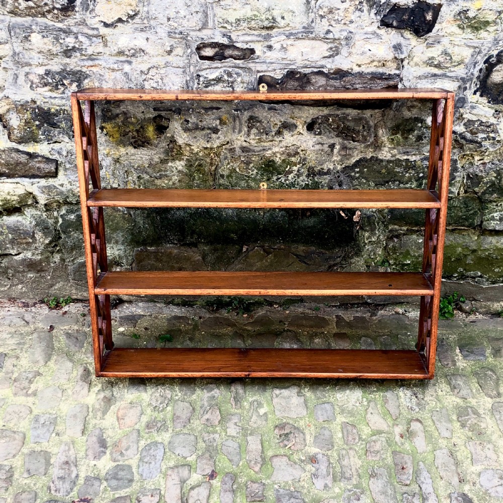 An set of Regency country shelves.  
