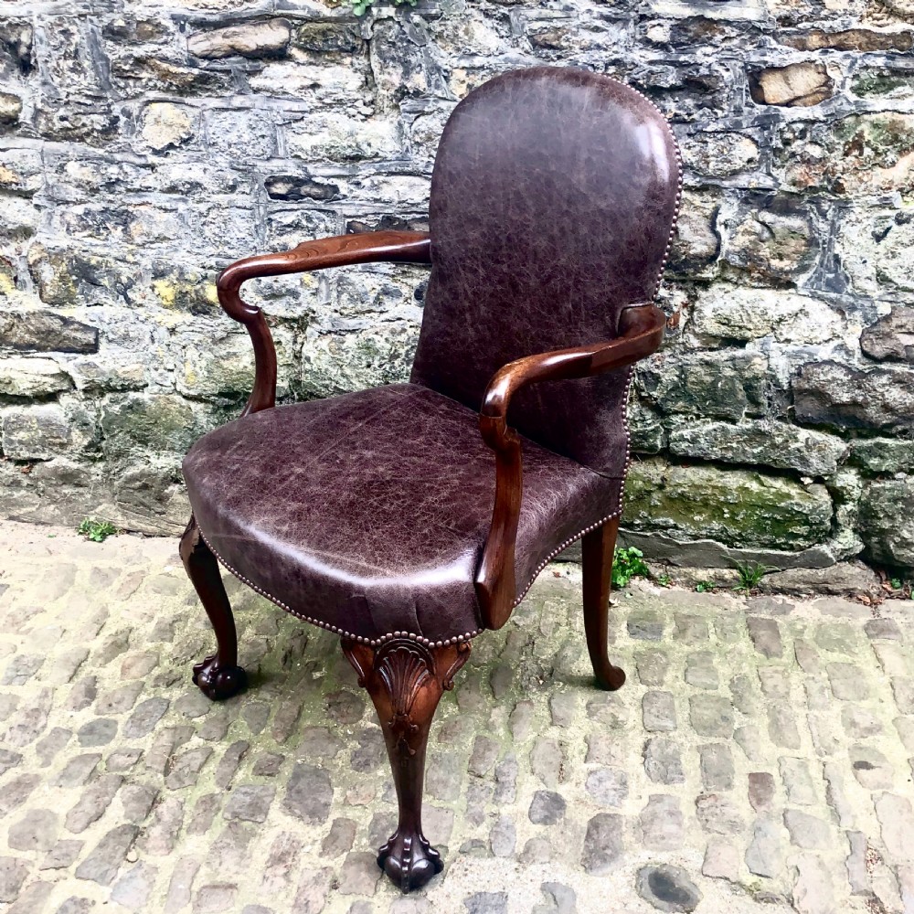 A late 19th century George II style walnut desk chair 