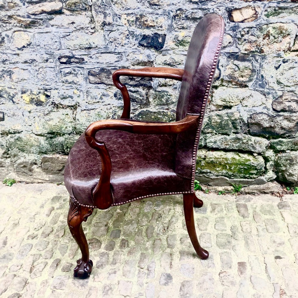 A late 19th century George II style walnut desk chair  View III