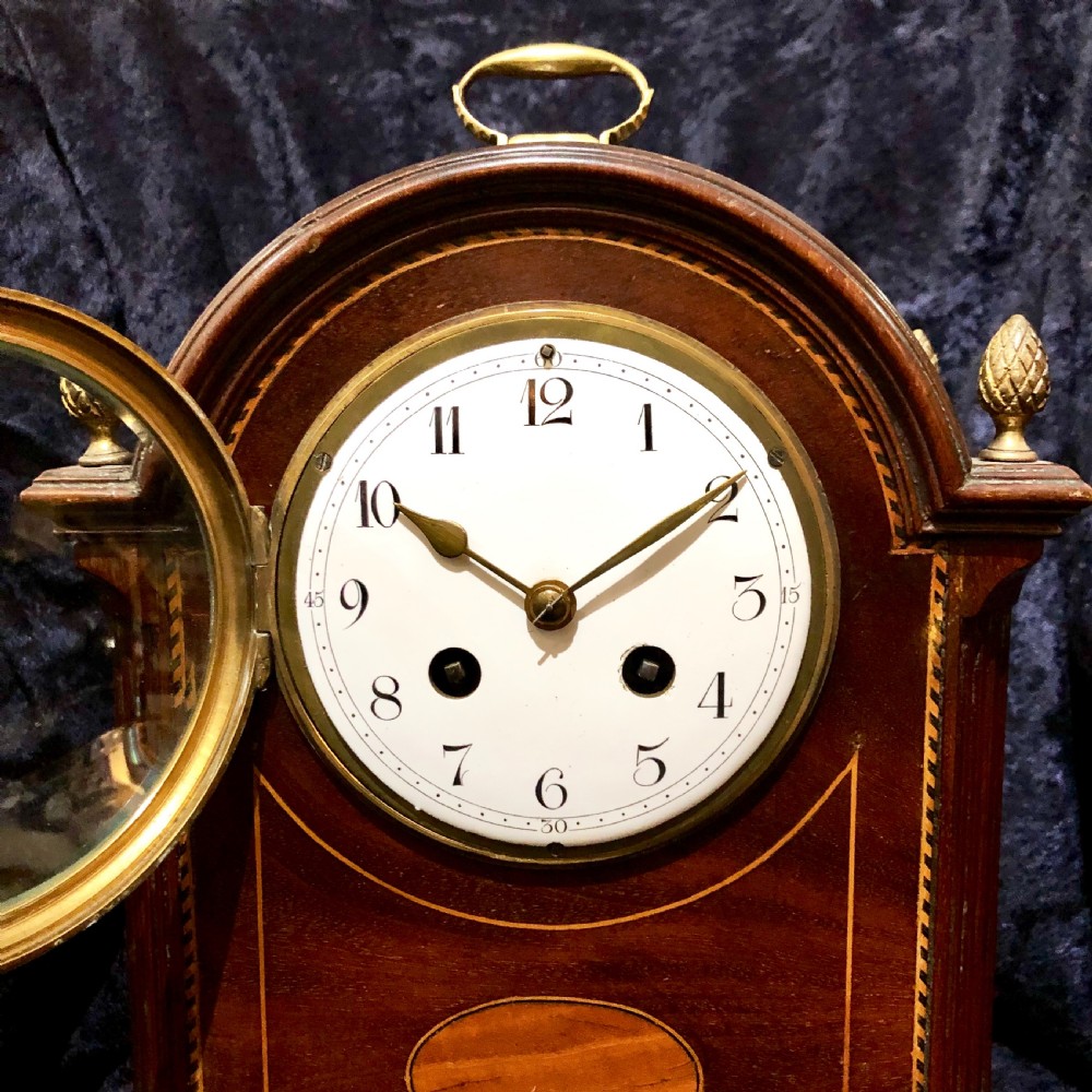 An Edwardian mahogany mantel clock  View II