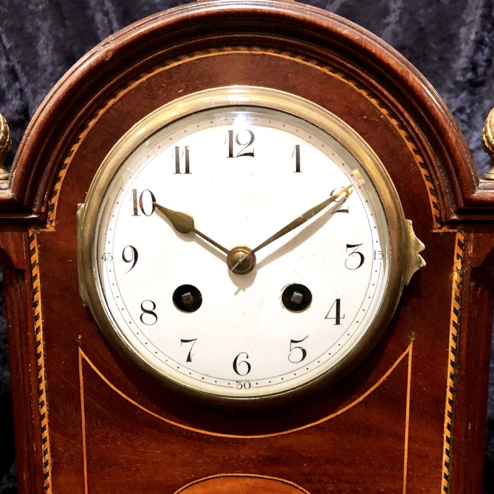 An Edwardian mahogany mantel clock  View IV
