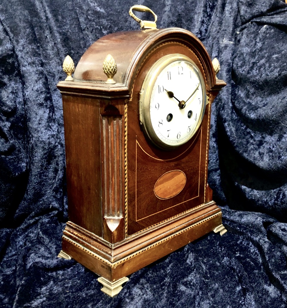 An Edwardian mahogany mantel clock  View V