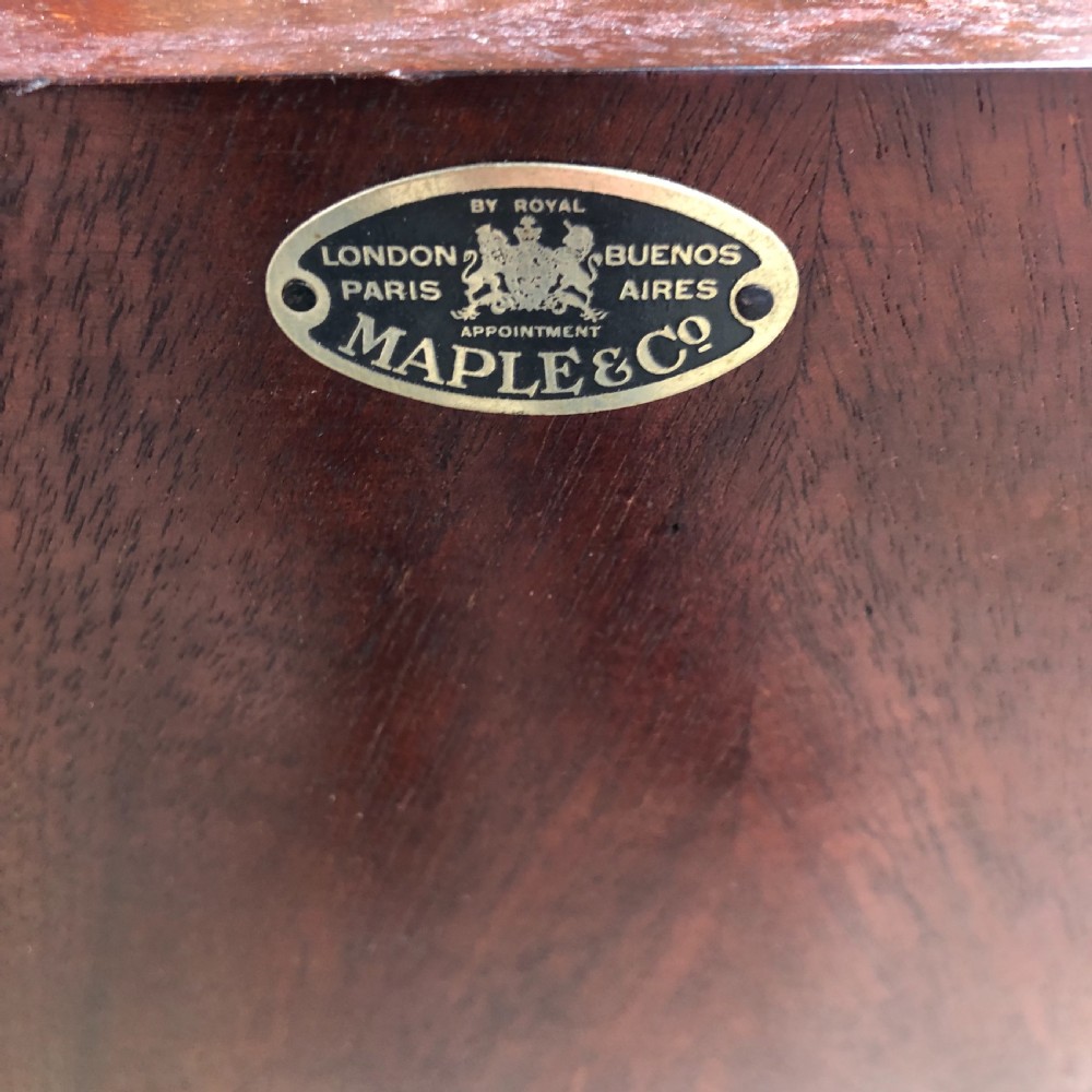 An Edwardian mahogany display cabinet on stand by Maples.  View III