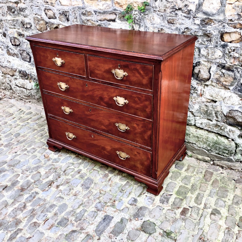 A George III mahogany chest of drawers  View II