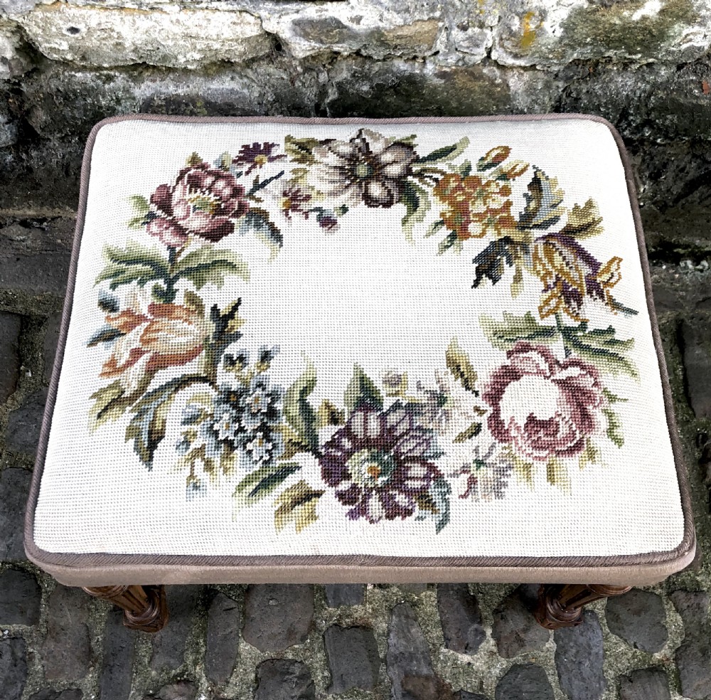 A Louis XVI style walnut dressing table stool.  View III