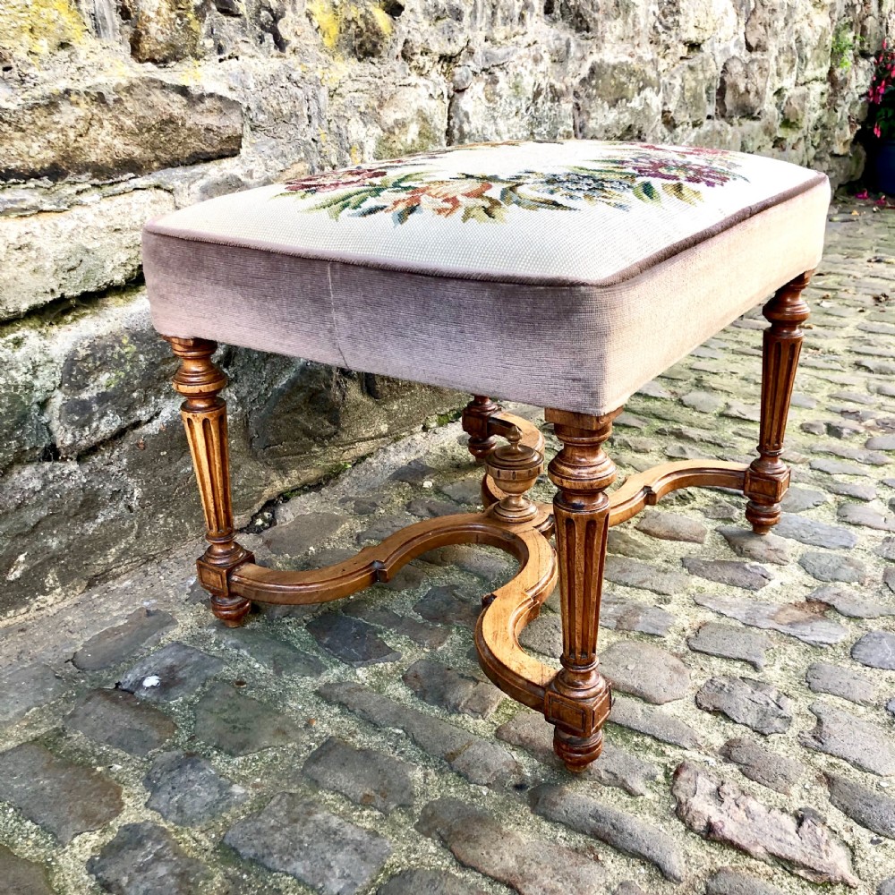 A Louis XVI style walnut dressing table stool.  View V