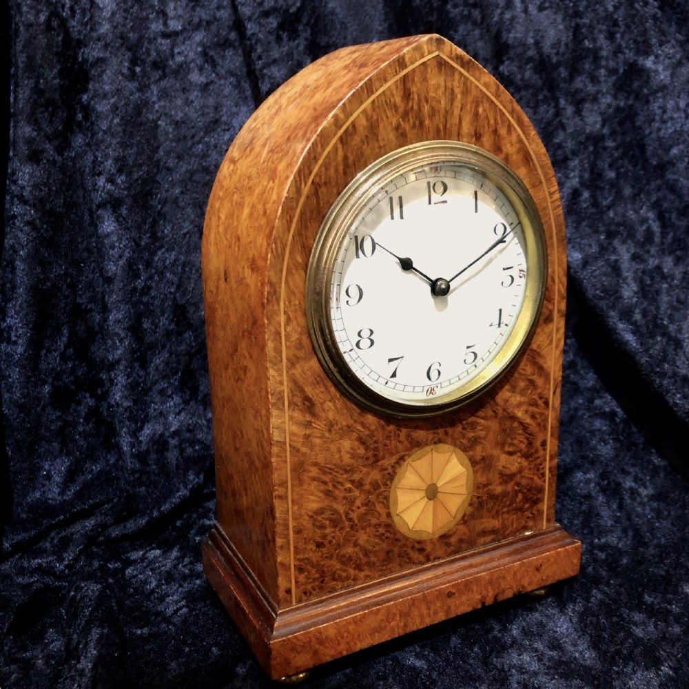 An Edwardian burr walnut mantel clock  View II