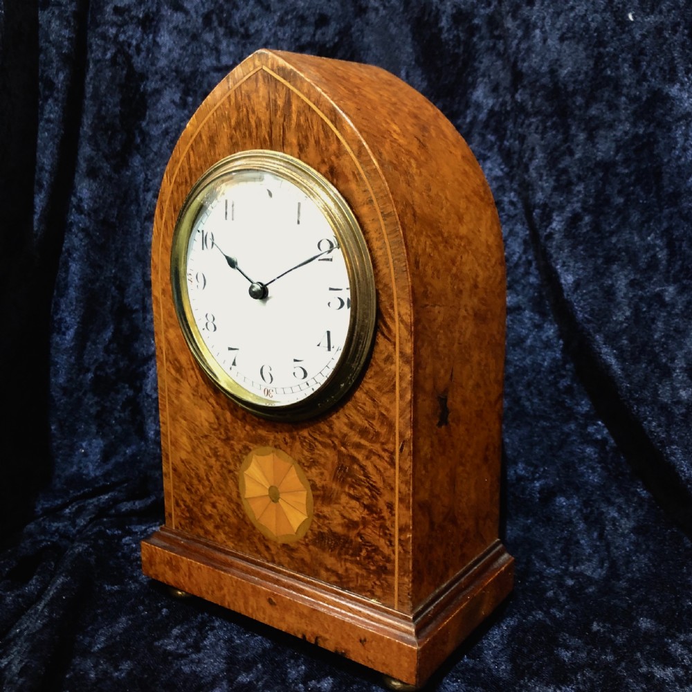An Edwardian burr walnut mantel clock  View IV