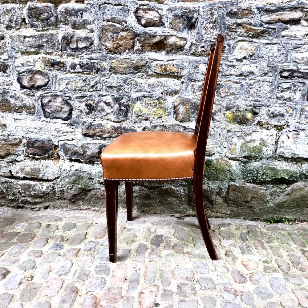 A set of four Sheraton Revival mahogany dining chairs  View V