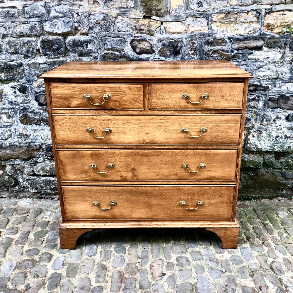 A George III oak chest of drawers 