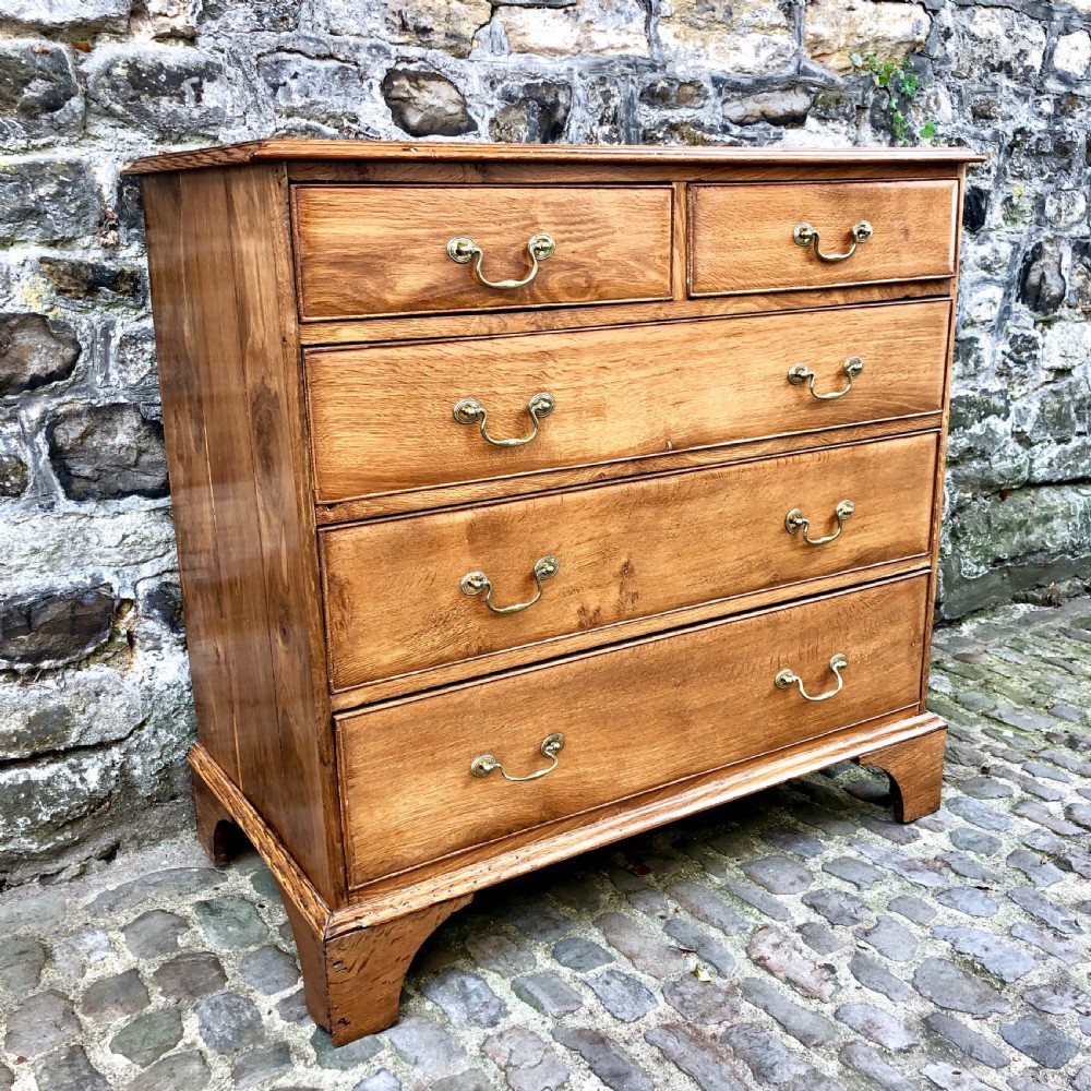 A George III oak chest of drawers  View II