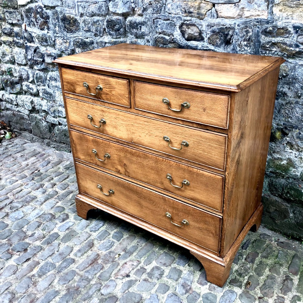 A George III oak chest of drawers  View III