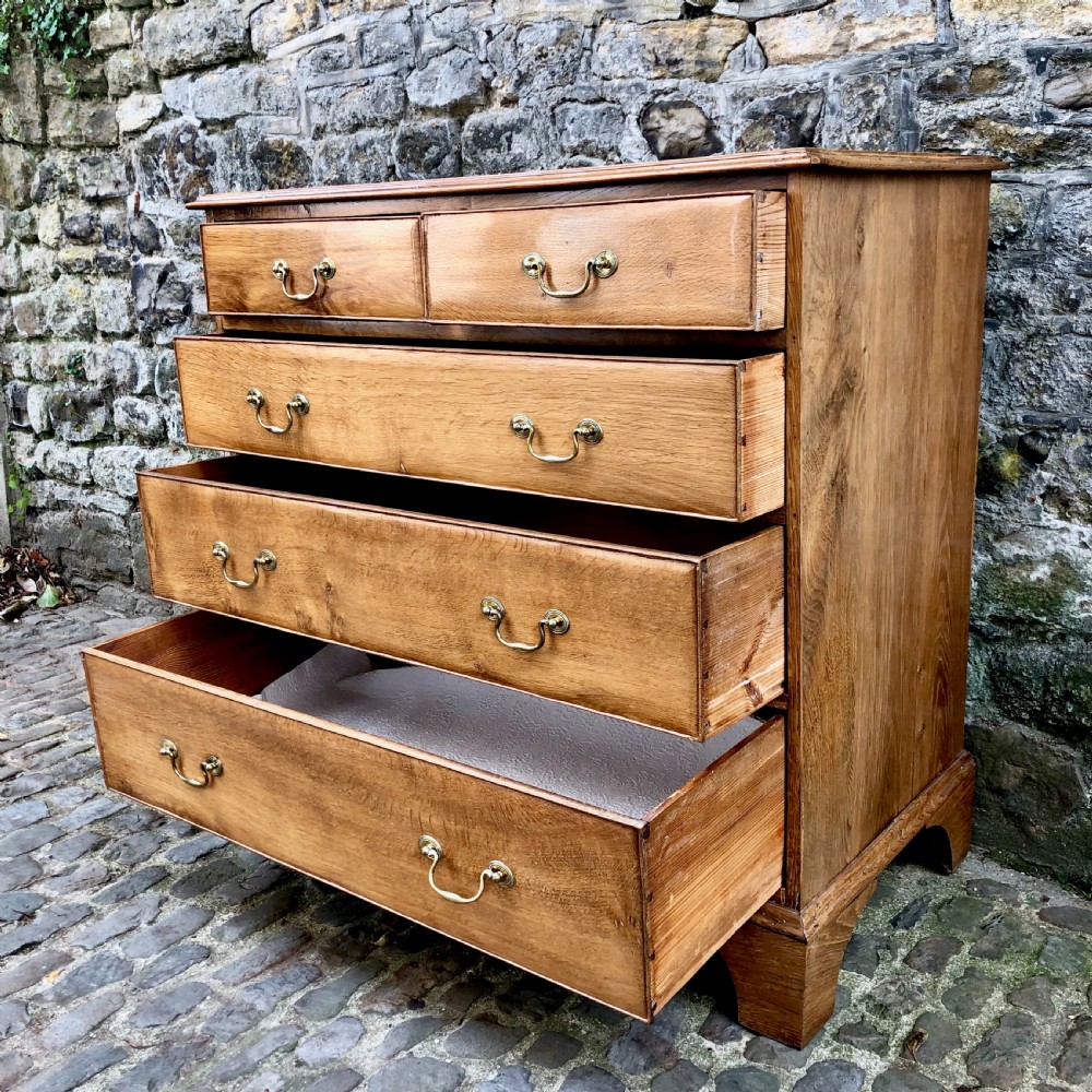 A George III oak chest of drawers  View V