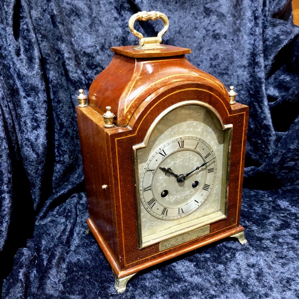A small Edwardian mahogany mantel clock  View II